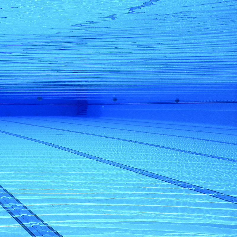 Underwater view within a large pool